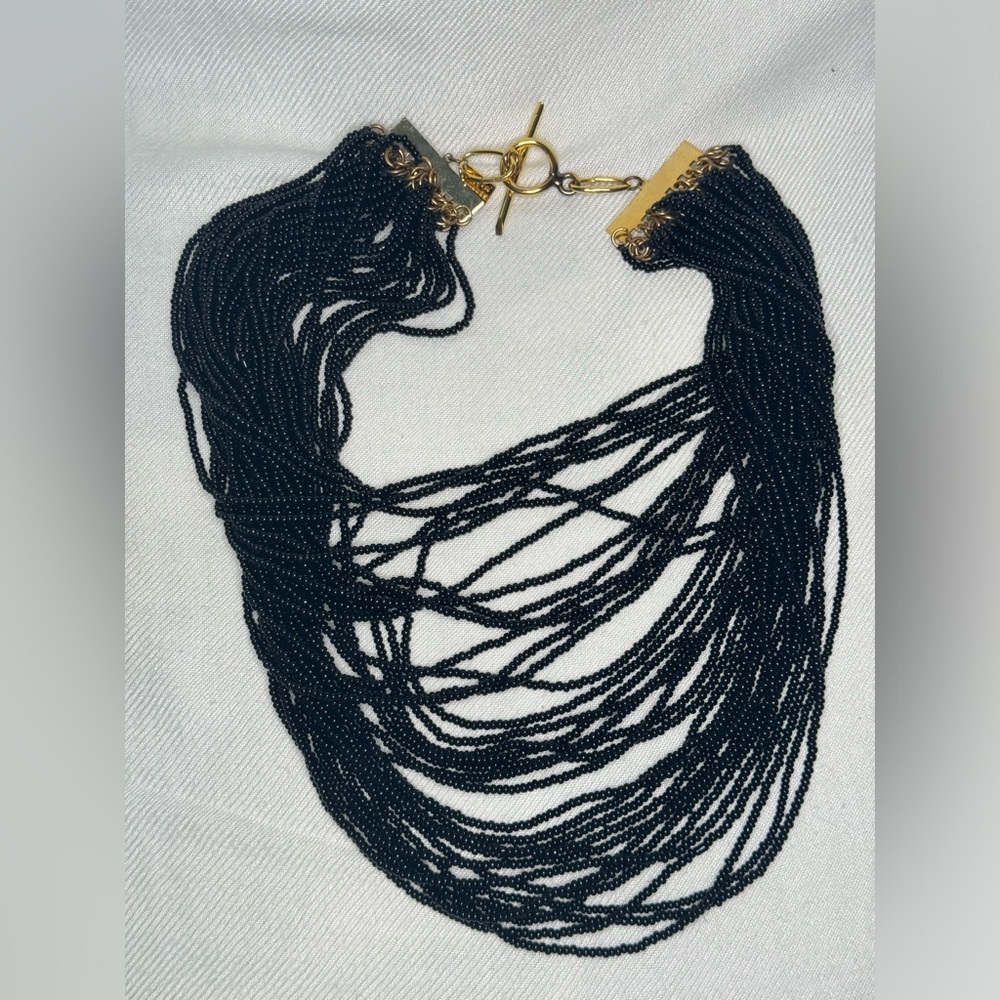 Serpui Marie Brazilian designer necklace good condition with marks black strands